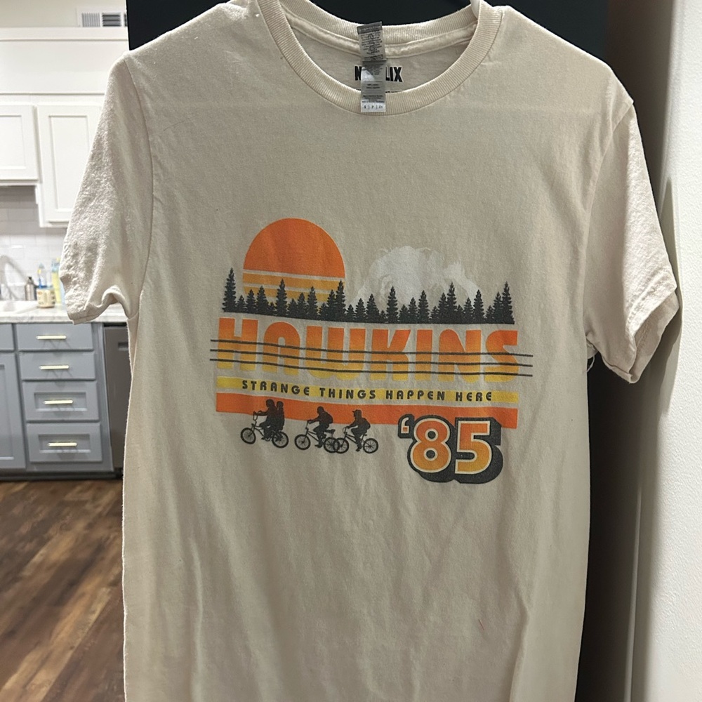 Netflix Cream Hawkins '85 Graphic Tee